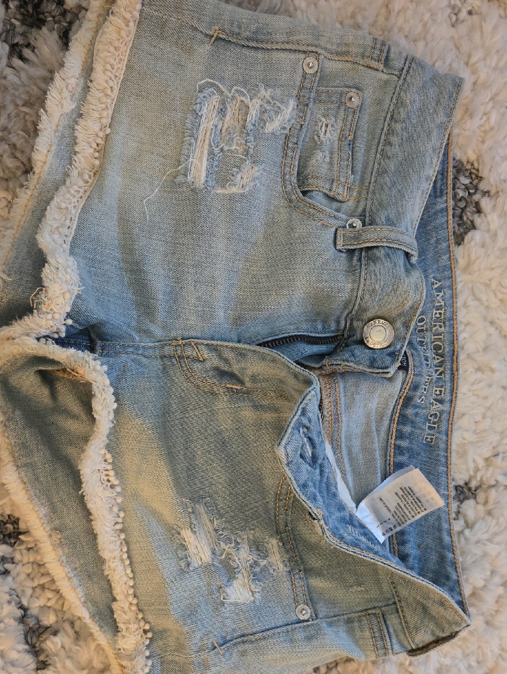 American Eagle Outfitters Light Blue Distressed Denim Shorts with Frayed Hem
